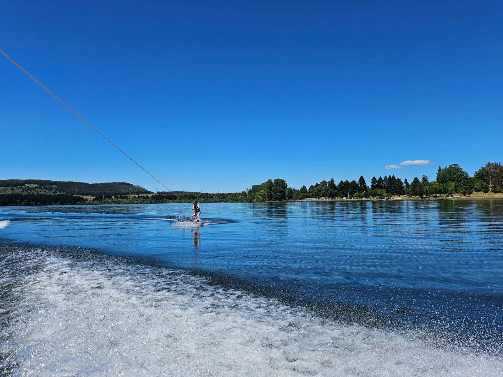 View of a rider from the wake boat